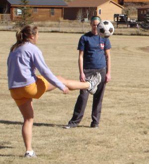 Molly showing Steph a trick she learned while playing in the Brazilian speedball league during her semester abroad.